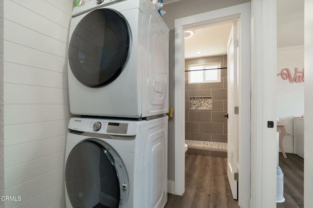208 S 4th St, Santa Paula, CA 93060 - laundry room with stacked washing machine and dryer and dark wood finished floors
