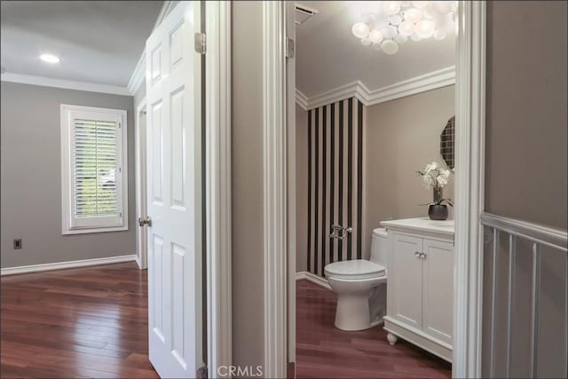 25225 Avenida Tranquila, Lake Forest, CA 92630 - half bathroom with ornamental molding, wood finished floors, and vanity