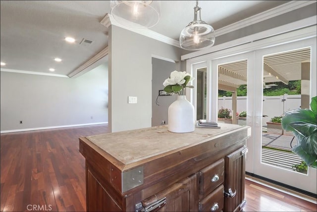 25225 Avenida Tranquila, Lake Forest, CA 92630 - kitchen featuring crown molding, french doors, dark wood-style floors, decorative light fixtures, and light countertops