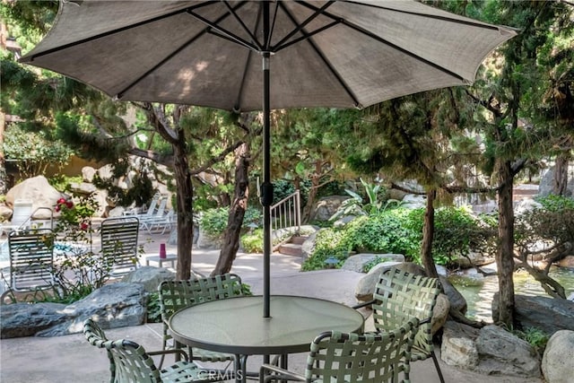 1645 Clark Ave Unit 115, Long Beach, CA 90815 - view of patio / terrace featuring outdoor dining space