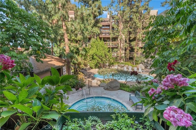 1645 Clark Ave Unit 115, Long Beach, CA 90815 - community pool featuring a community hot tub and a patio