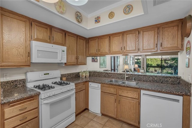 1645 Clark Ave Unit 115, Long Beach, CA 90815 - kitchen featuring white appliances, brown cabinets, light tile patterned flooring, and dark stone countertops