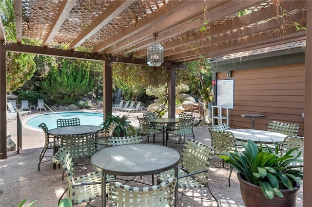 1645 Clark Ave Unit 115, Long Beach, CA 90815 - view of patio / terrace featuring a pergola and a community pool