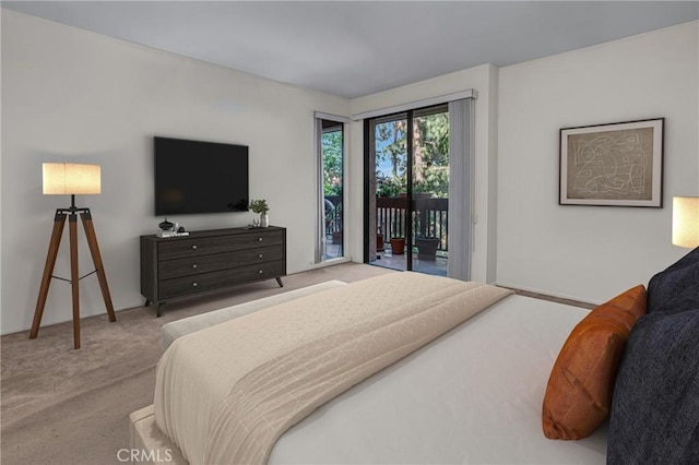 1645 Clark Ave Unit 115, Long Beach, CA 90815 - carpeted bedroom featuring access to exterior