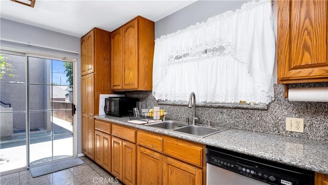 2116 Marine Ave, Gardena, CA 90249 - kitchen featuring dishwasher, granite floors, backsplash, and black microwave
