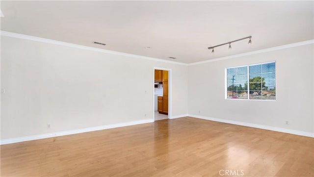 2116 Marine Ave, Gardena, CA 90249 - empty room with rail lighting, light wood finished floors, and ornamental molding