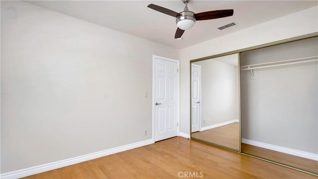 2116 Marine Ave, Gardena, CA 90249 - unfurnished bedroom with wood finished floors, a closet, and ceiling fan