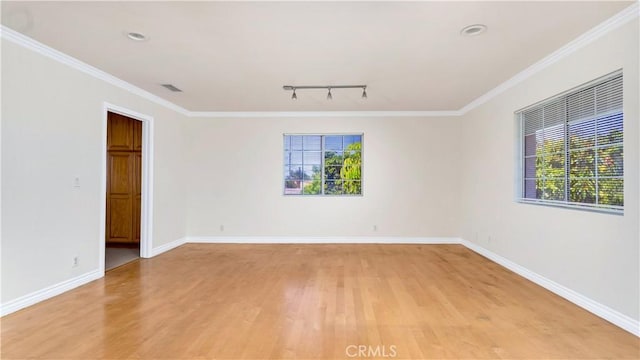 2116 Marine Ave, Gardena, CA 90249 - empty room featuring track lighting, light wood finished floors, and ornamental molding
