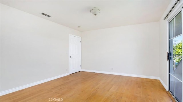 2116 Marine Ave, Gardena, CA 90249 - spare room with light wood finished floors and baseboards