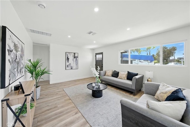 5243 Tara Pl, San Diego, CA 92117 - living area featuring light wood-style floors and recessed lighting