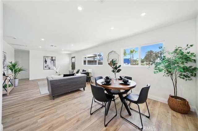 5243 Tara Pl, San Diego, CA 92117 - dining area with light wood-style floors and recessed lighting