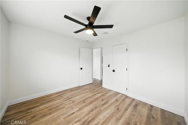 5243 Tara Pl, San Diego, CA 92117 - unfurnished bedroom with light wood-style flooring, a ceiling fan, and a closet