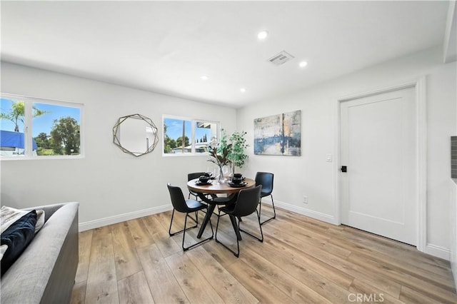 5243 Tara Pl, San Diego, CA 92117 - dining space with light wood finished floors and recessed lighting