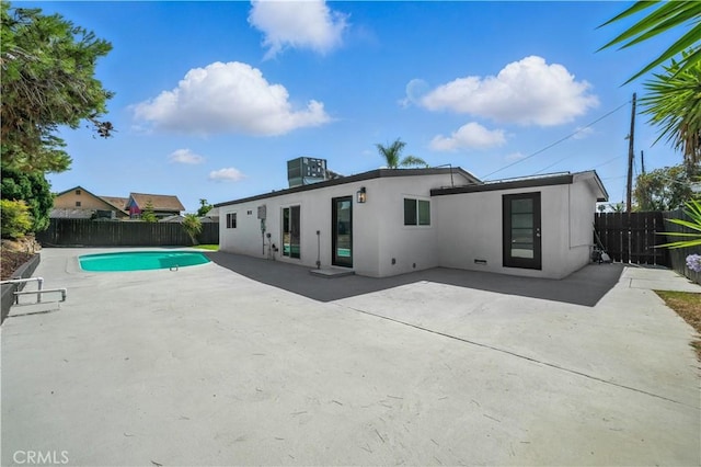 5243 Tara Pl, San Diego, CA 92117 - back of property featuring stucco siding, a fenced backyard, and a patio