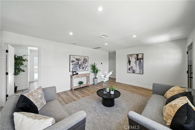 5243 Tara Pl, San Diego, CA 92117 - living room with wood finished floors and recessed lighting