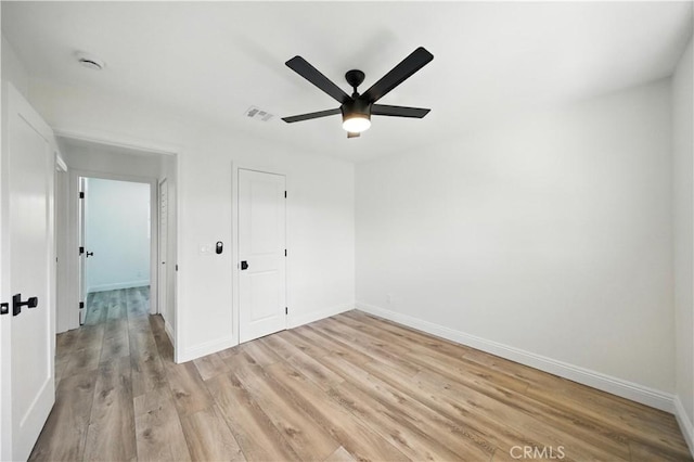 5243 Tara Pl, San Diego, CA 92117 - unfurnished bedroom with light wood finished floors, a ceiling fan, and a closet