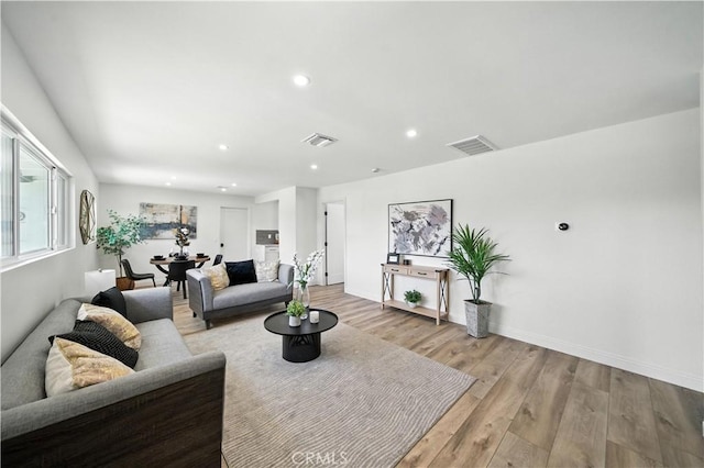5243 Tara Pl, San Diego, CA 92117 - living area with light wood finished floors and recessed lighting