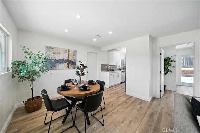 5243 Tara Pl, San Diego, CA 92117 - dining room with light wood-style flooring and recessed lighting