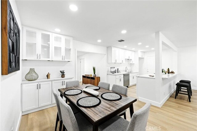 1170 Turquoise St, Hemet, CA 92543 - dining room with light wood-style floors and recessed lighting