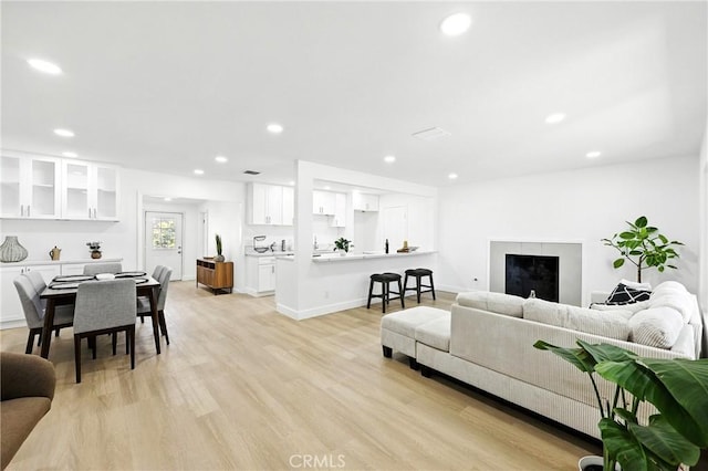 1170 Turquoise St, Hemet, CA 92543 - living room featuring light wood-type flooring and recessed lighting