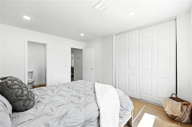1170 Turquoise St, Hemet, CA 92543 - bedroom with recessed lighting, light wood-type flooring, a closet, and ensuite bath