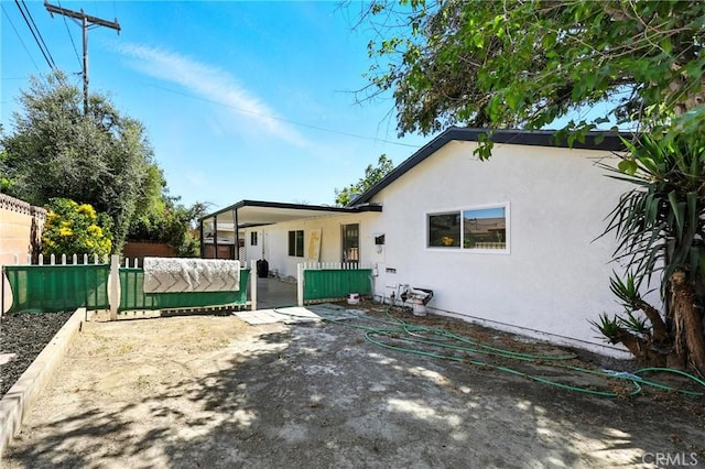 1170 Turquoise St, Hemet, CA 92543 - back of house with stucco siding and a patio area