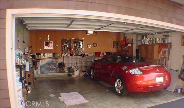 12555 Euclid St Unit 79, Garden Grove, CA 92840 - garage with a workshop area