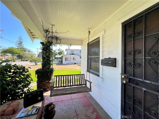 3855 Maine Ave, Baldwin Park, CA 91706 - entrance to property featuring covered porch