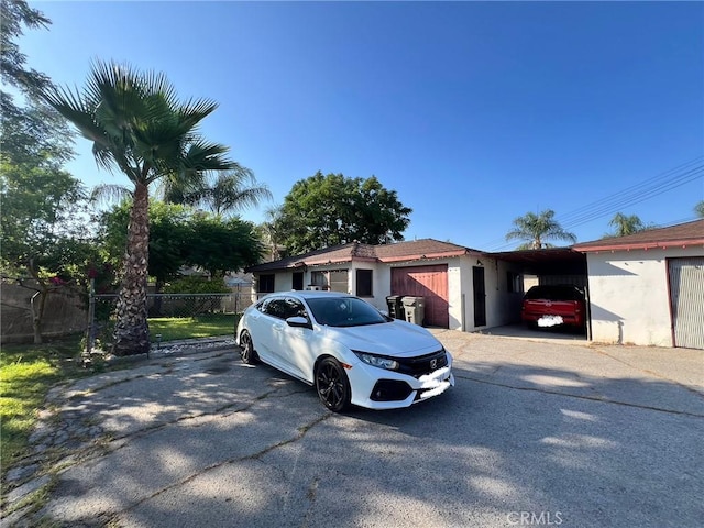 3855 Maine Ave, Baldwin Park, CA 91706 - ranch-style home featuring stucco siding and a carport