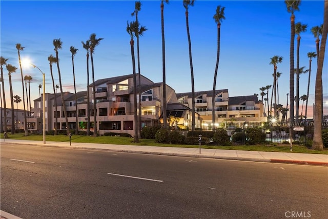 1200 Pacific Coast Unit 214, Huntington Beach, CA 92648 - view of property at dusk