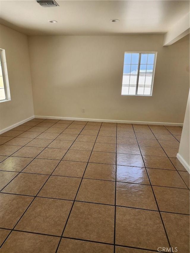 38638 Glenraven Ave, Palmdale, CA 93550 - spare room featuring healthy amount of natural light, tile patterned flooring, and recessed lighting