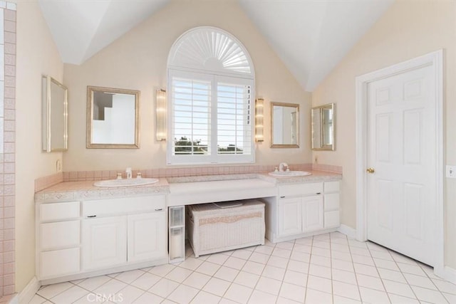25912 Densmore Dr, Lake Forest, CA 92630 - full bath featuring double vanity, lofted ceiling, and tile patterned floors