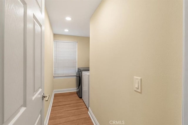 25912 Densmore Dr, Lake Forest, CA 92630 - washroom with separate washer and dryer, recessed lighting, and light wood-type flooring
