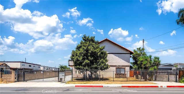 3687 Durfee Ave Unit 3, El Monte, CA 91732 - view of property hidden behind natural elements featuring a gate and a fenced front yard