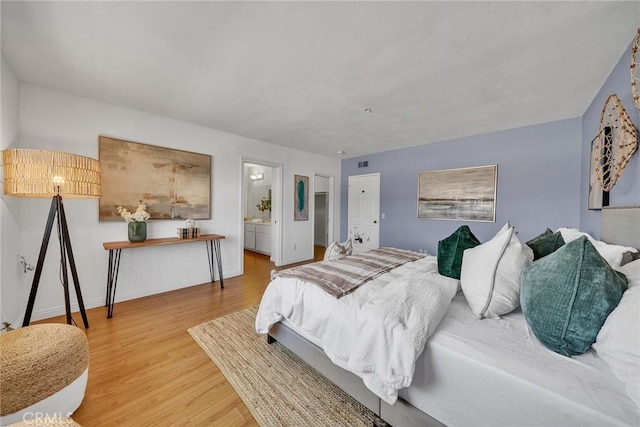3687 Durfee Ave Unit 3, El Monte, CA 91732 - bedroom with wood finished floors and ensuite bathroom