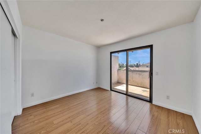 3687 Durfee Ave Unit 3, El Monte, CA 91732 - unfurnished room with light wood-style floors and baseboards