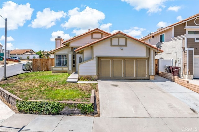 25671 Roylene Dr, Menifee, CA 92586 - view of front facade with a tile roof, driveway, an attached garage, and a chimney