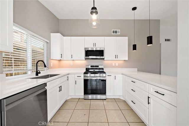 25671 Roylene Dr, Menifee, CA 92586 - kitchen featuring stainless steel appliances, light countertops, and white cabinetry