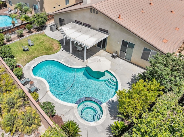 11567 Waterwell Ct, Riverside, CA 92505 - view of pool featuring a patio area, a fenced backyard, and a pool with connected hot tub