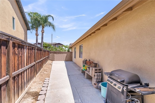11567 Waterwell Ct, Riverside, CA 92505 - fenced backyard featuring area for grilling and a patio area