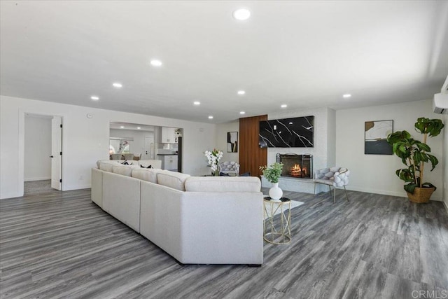 1327 Walbollen St, Spring Valley, CA 91977 - living room featuring wood finished floors, recessed lighting, and a fireplace