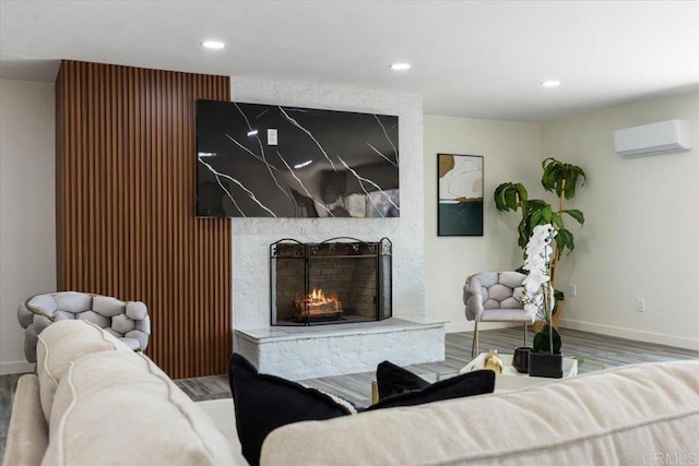 1327 Walbollen St, Spring Valley, CA 91977 - living room with a wall unit AC, wood finished floors, a fireplace, and recessed lighting