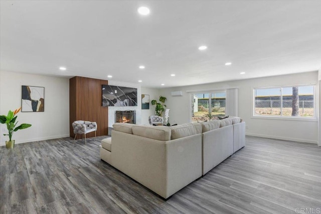 1327 Walbollen St, Spring Valley, CA 91977 - living room with recessed lighting, wood finished floors, and a large fireplace