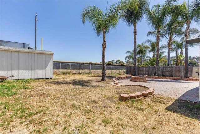 1327 Walbollen St, Spring Valley, CA 91977 - fenced backyard with a fire pit