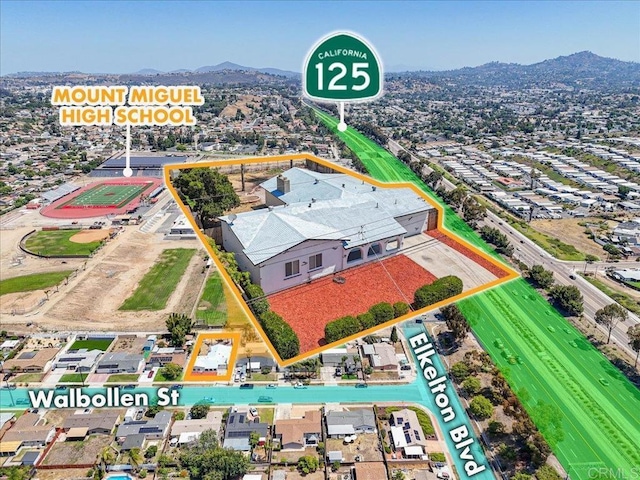 1327 Walbollen St, Spring Valley, CA 91977 - aerial view of property's location with property parcel outlined and a mountain backdrop
