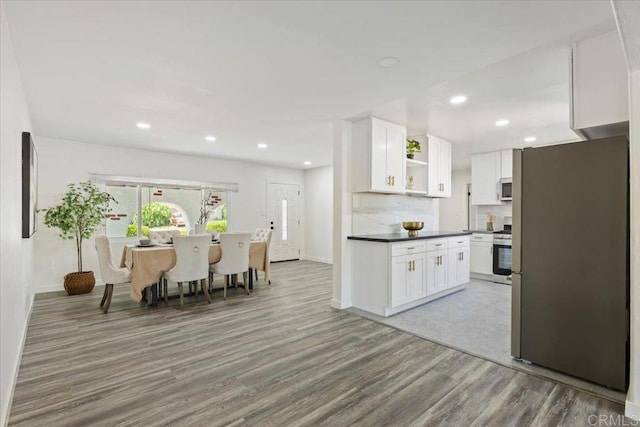 1327 Walbollen St, Spring Valley, CA 91977 - kitchen featuring freestanding refrigerator, open shelves, range, dark countertops, and wood finished floors