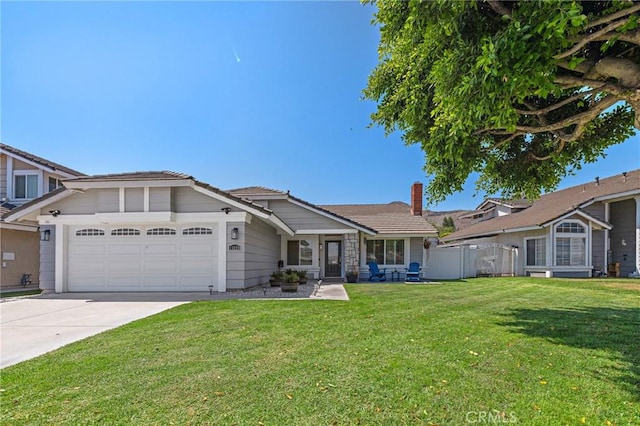 13220 February Dr, Corona, CA 92879 - single story home featuring a garage, concrete driveway, and a chimney