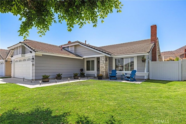 13220 February Dr, Corona, CA 92879 - view of front of house with a tile roof and an attached garage