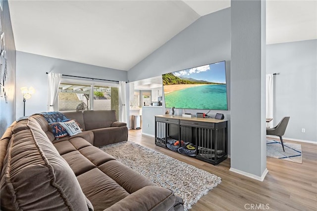 13220 February Dr, Corona, CA 92879 - living area featuring wood finished floors and high vaulted ceiling