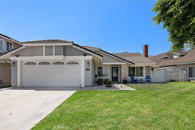 13220 February Dr, Corona, CA 92879 - view of front of property with a tile roof, a garage, concrete driveway, and a front yard